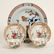 A pair of 18th Century Chinese tea bowls and saucers,