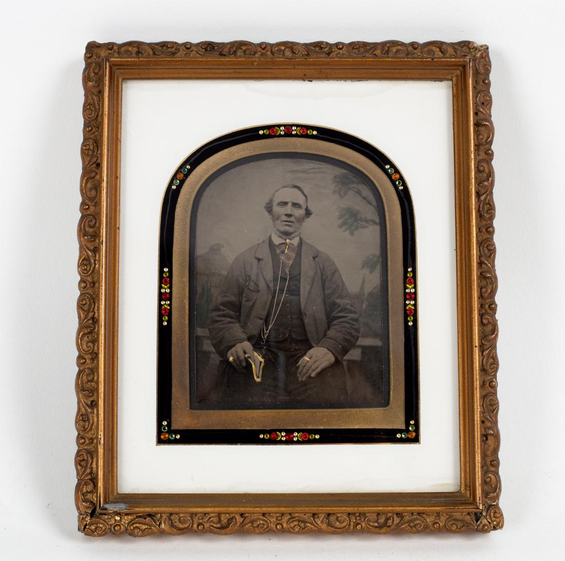 A 19th Century ambrotype portrait of a man highlighted: A 19th Century ambrotype portrait of a man highlighted in gilt, 9cm x 7cm