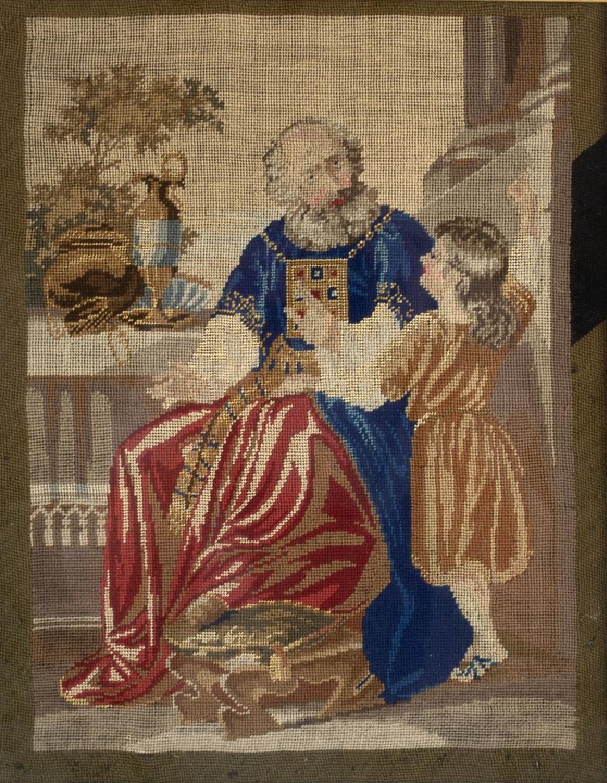 A Victorian needlework picture of a priest and child, (1 of 2)