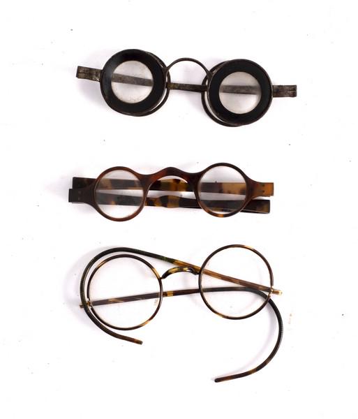 A pair of steel framed spectacles in a case with hinged (1 of 2)