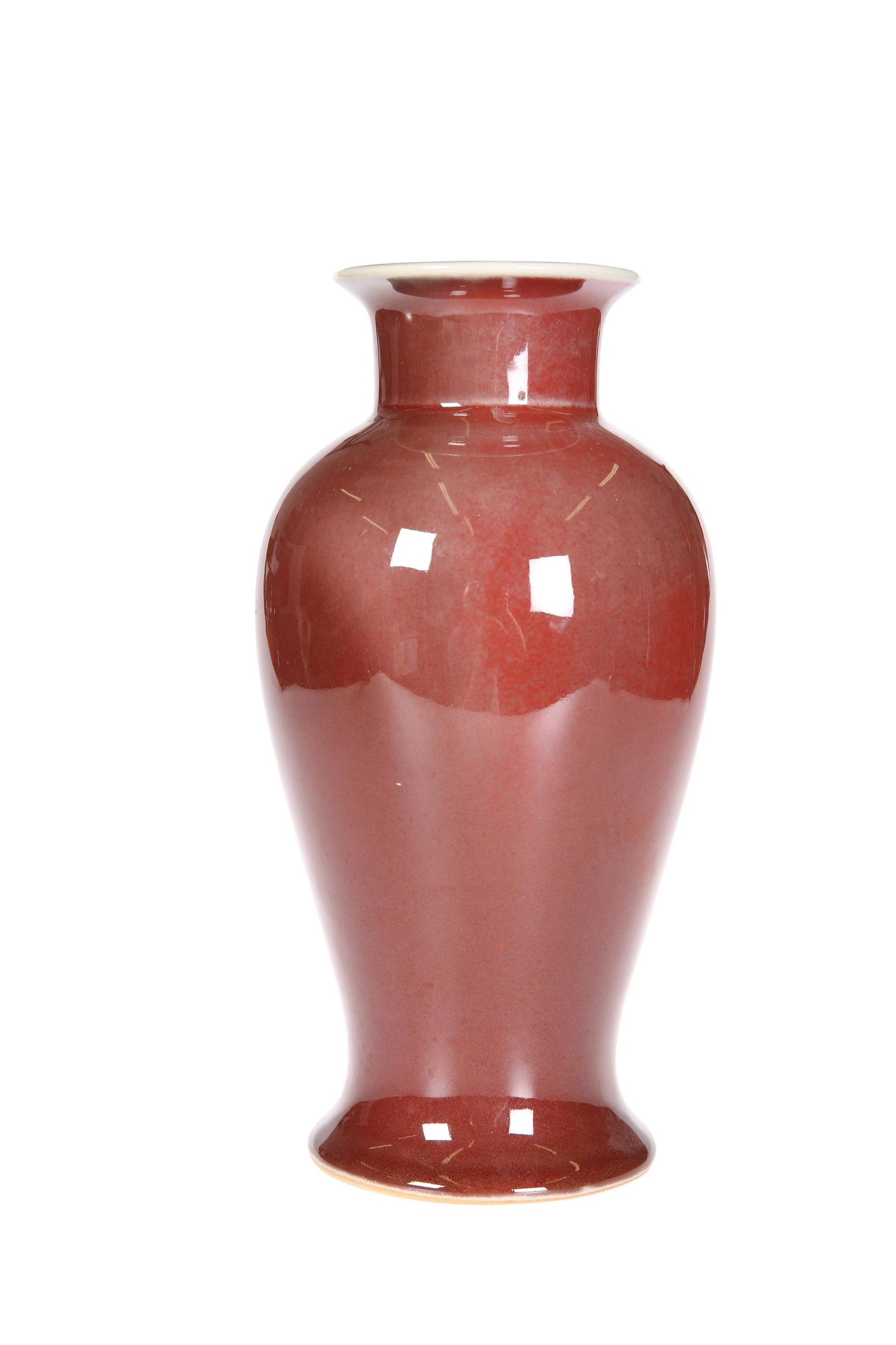 A CHINESE OX BLOOD GLAZED VASE, of baluster form.: A CHINESE OX BLOOD GLAZED VASE, of baluster form. 25.5cm