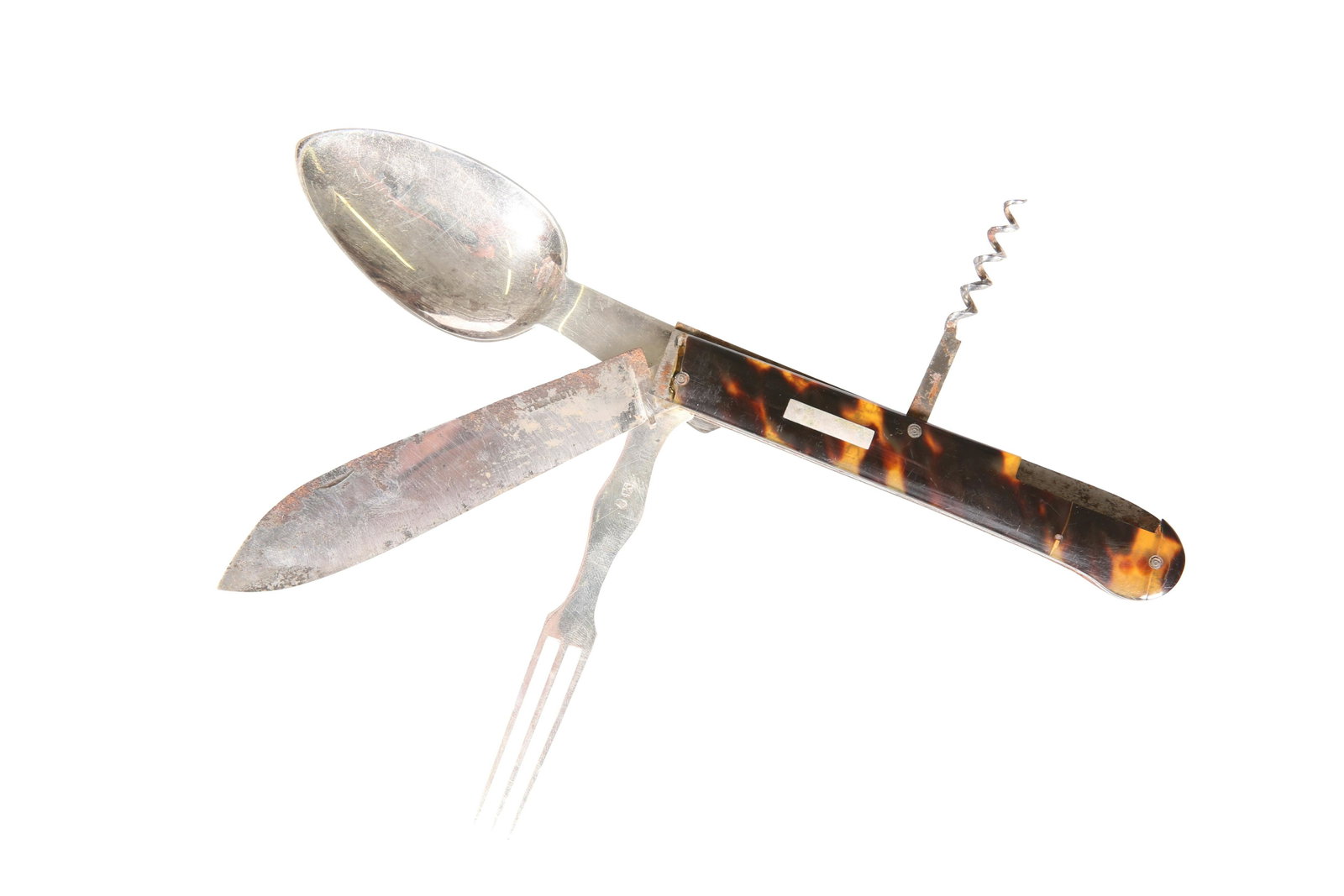 A GEORGE III SILVER AND TORTOISESHELL CAMPAIGN TOOL,: A GEORGE III SILVER AND TORTOISESHELL CAMPAIGN TOOL, the silver spoon marked for Samuel Godbehere, Edward Wigan and James Boult, London 1808, with folding knife, corkscrew etc. 12.75cm