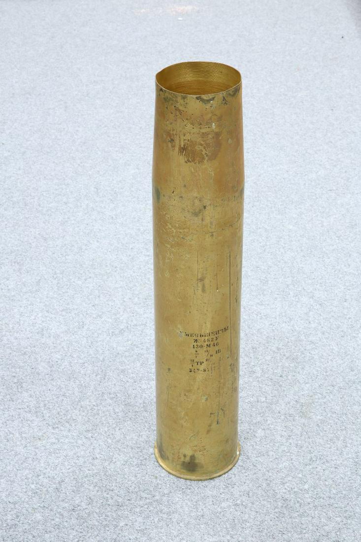 AN EXTREMELY LARGE RUSSIAN BRASS SHELL CASE STICKSTAND,: AN EXTREMELY LARGE RUSSIAN BRASS SHELL CASE STICKSTAND, with markings. 84.5cm