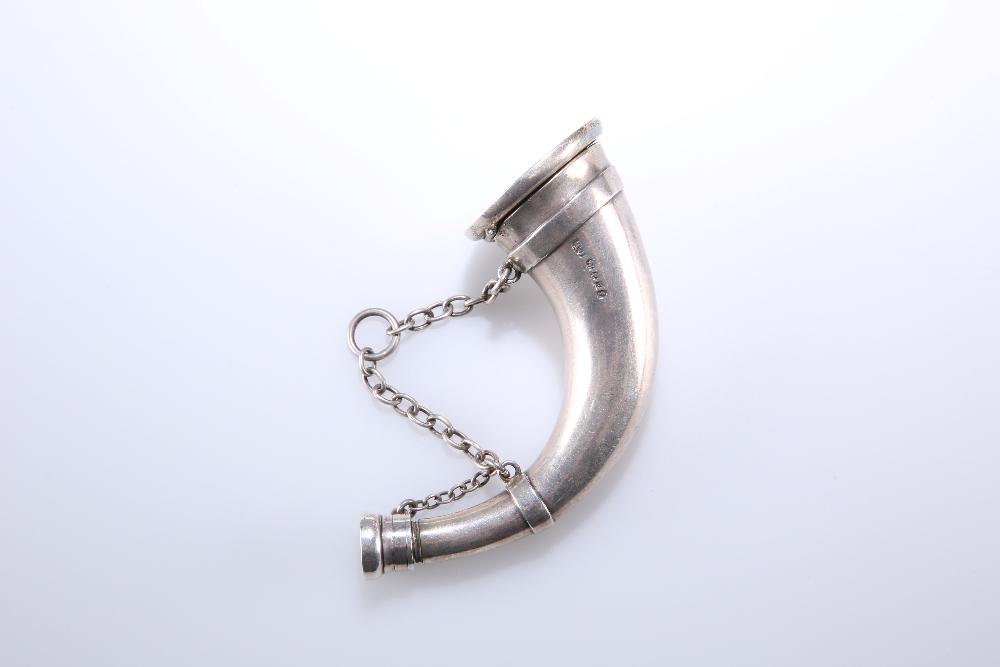AN UNUSUAL MID-VICTORIAN SILVER COMBINATION SCENT: AN UNUSUAL MID-VICTORIAN SILVER COMBINATION SCENT BOTTLE AND VINAIGRETTE, MODELLED AS A HUNTING HORN, THOMAS JOHNSON I, LONDON 1873, the "mouthpiece" with screw cover and safety chain, the opposing en
