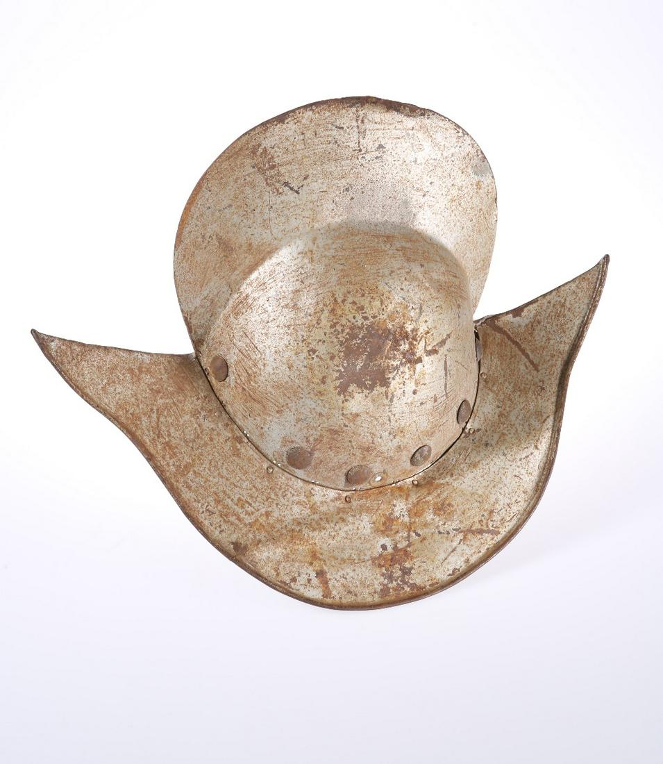 A COMB MORION (HELMET), of characteristic form. 46cm: A COMB MORION (HELMET), of characteristic form. 46cm front to back