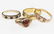 A COLLECTION OF FOUR YELLOW GOLD RINGS to include a 9ct
