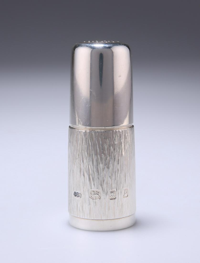 AN ELIZABETH II SILVER PEPPER POT by Gerald Benney,: AN ELIZABETH II SILVER PEPPER POT by Gerald Benney, London 1970 Of slightly tapering form with textured lower body, hallmarked and further signed to the base "GERALD BENNEY LONDON". 10cm high. 4.4 tro