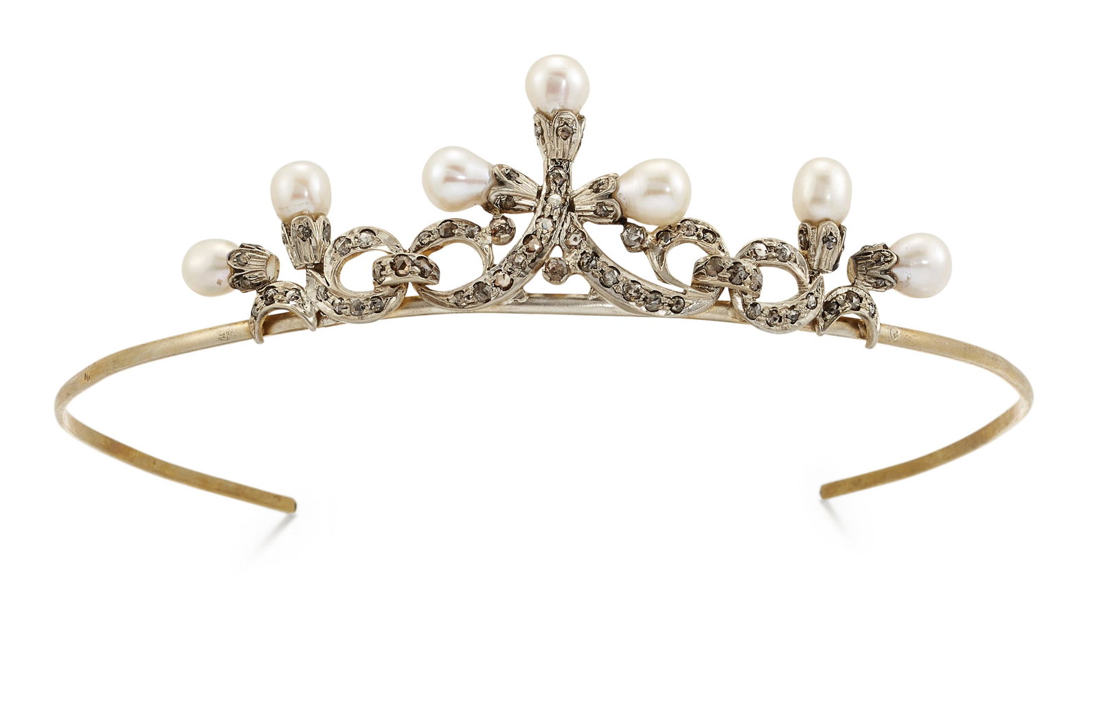 AN EDWARDIAN CULTURED PEARL AND DIAMOND TIARA, the: AN EDWARDIAN CULTURED PEARL AND DIAMOND TIARA, the yellow metal band set to centre with three pear shaped cultured pearls, mounted in rose cut diamond caps, on curled ribbons down to the band, with a 