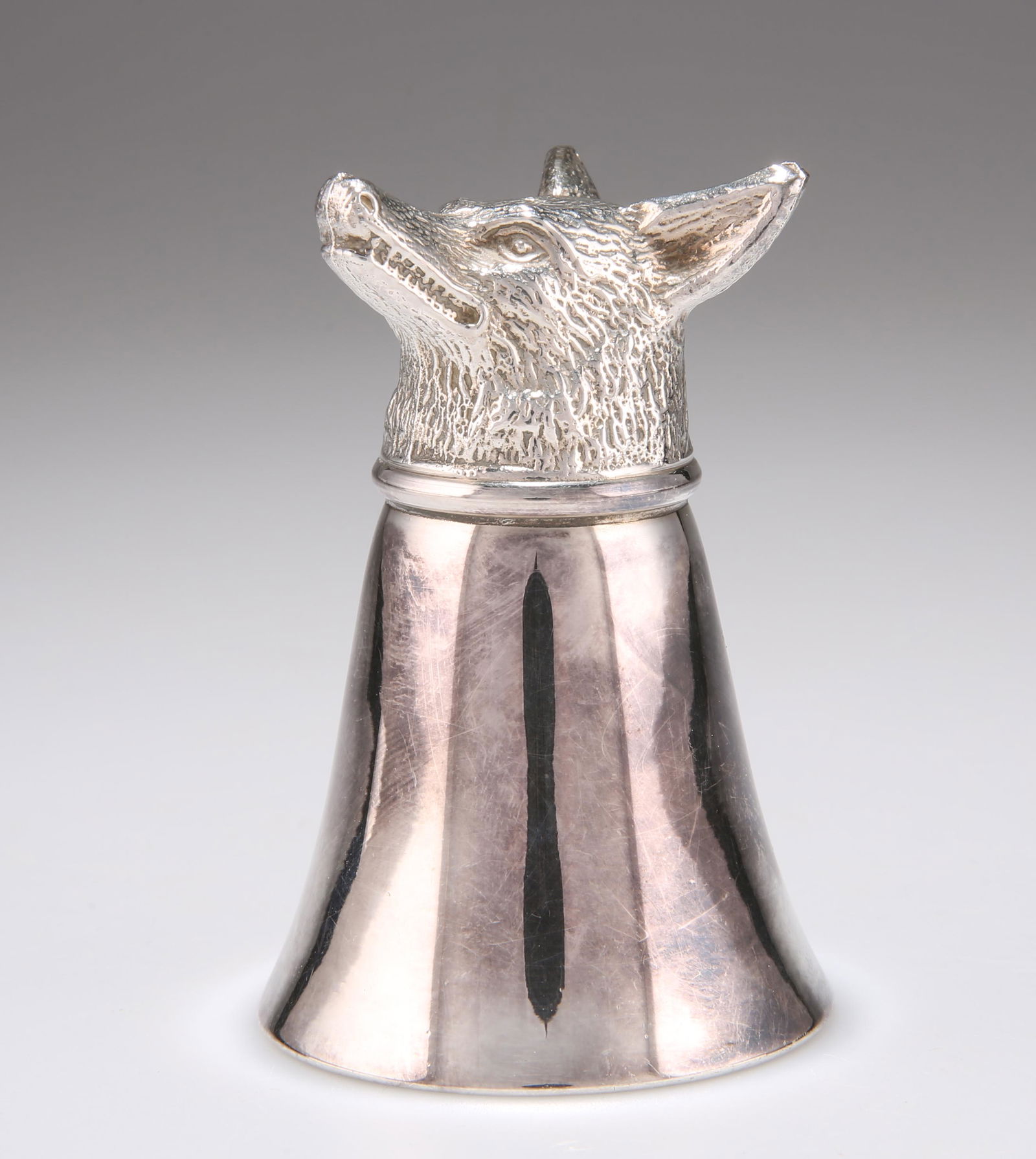 A SILVER-PLATED FOX HEAD STIRRUP CUP, of small (1 of 3)