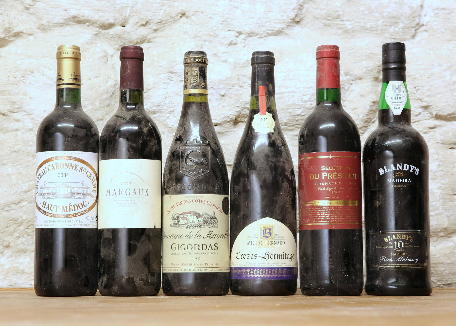 6 BOTTLES MIXED LOT INCLUDING GOOD CLARET, RHONE AND: 6 BOTTLES MIXED LOT INCLUDING GOOD CLARET, RHONE AND MADEIRA COMPRISING; 1 BOTTLE CHATEAU CARRONE STE GEMME CRU BOURGEOIS MEDOC 2004 (b/n) 1 BOTTLE MARGAUX LUCIEN LURTON 1993 (t/s) 1 BOTTLE CROZES HER