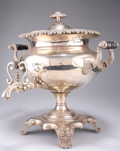 A 19TH CENTURY SILVER-PLATED SAMOVAR, by Parkinson's,: A 19TH CENTURY SILVER-PLATED SAMOVAR, by Parkinson's, 79 Oxford St. London, the squat baluster body with acanthus leaf overturned rim and reeded scroll handles having turned wood insulators, the