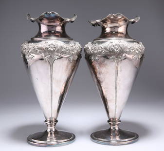 A LARGE PAIR OF ART NOUVEAU SILVER-PLATED VASES, of: A LARGE PAIR OF ART NOUVEAU SILVER-PLATED VASES, of shouldered conical form with undulating rim, chased with stylised foliage. 26cm high