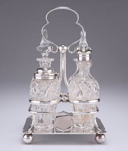 A LATE VICTORIAN ELECTROPLATED FOUR-BOTTLE CRUET SET,: A LATE VICTORIAN ELECTROPLATED FOUR-BOTTLE CRUET SET, by Fattorini & Sons, the stand with ball feet and loop handle, the lobed bottle with prism cutting. 21.5cm high