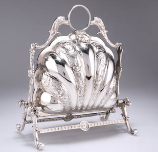 A VICTORIAN SILVER-PLATED MUFFIN DISH, folding,: A VICTORIAN SILVER-PLATED MUFFIN DISH, folding, shell-form, chased with scrolls and foliage. 24cm high