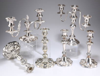 A GROUP OF SILVER-PLATED CANDLESTICKS AND CANDELABRA,: A GROUP OF SILVER-PLATED CANDLESTICKS AND CANDELABRA, comprising two pairs of 19th Century Rococo Revival candlesticks, three-light candelabrum with beaded rims and two-light low candelabrum. (6)