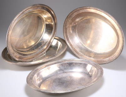 A SET OF FOUR FRENCH SILVER-PLATED SERVING DISHES, by: A SET OF FOUR FRENCH SILVER-PLATED SERVING DISHES, by Christofle, each of plain oval form, with reeded and crossed ribbon rim, stamped to underside of rim. 30.8cm wide