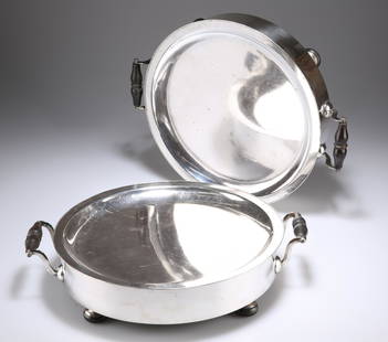 A PAIR OF OLD SHEFFIELD PLATE WARMING DISHES, circular: A PAIR OF OLD SHEFFIELD PLATE WARMING DISHES, circular with turned handles and wooden bun feet. 33cm across handles