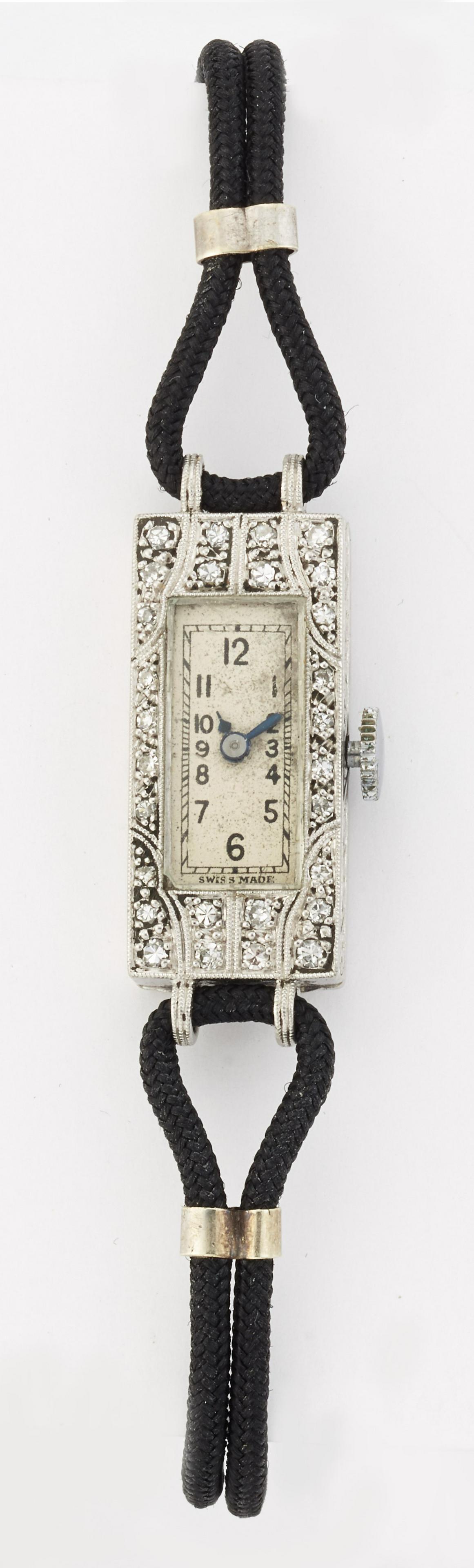 A DIAMOND COCKTAIL WATCH, the rectangular silvered dial (1 of 1)