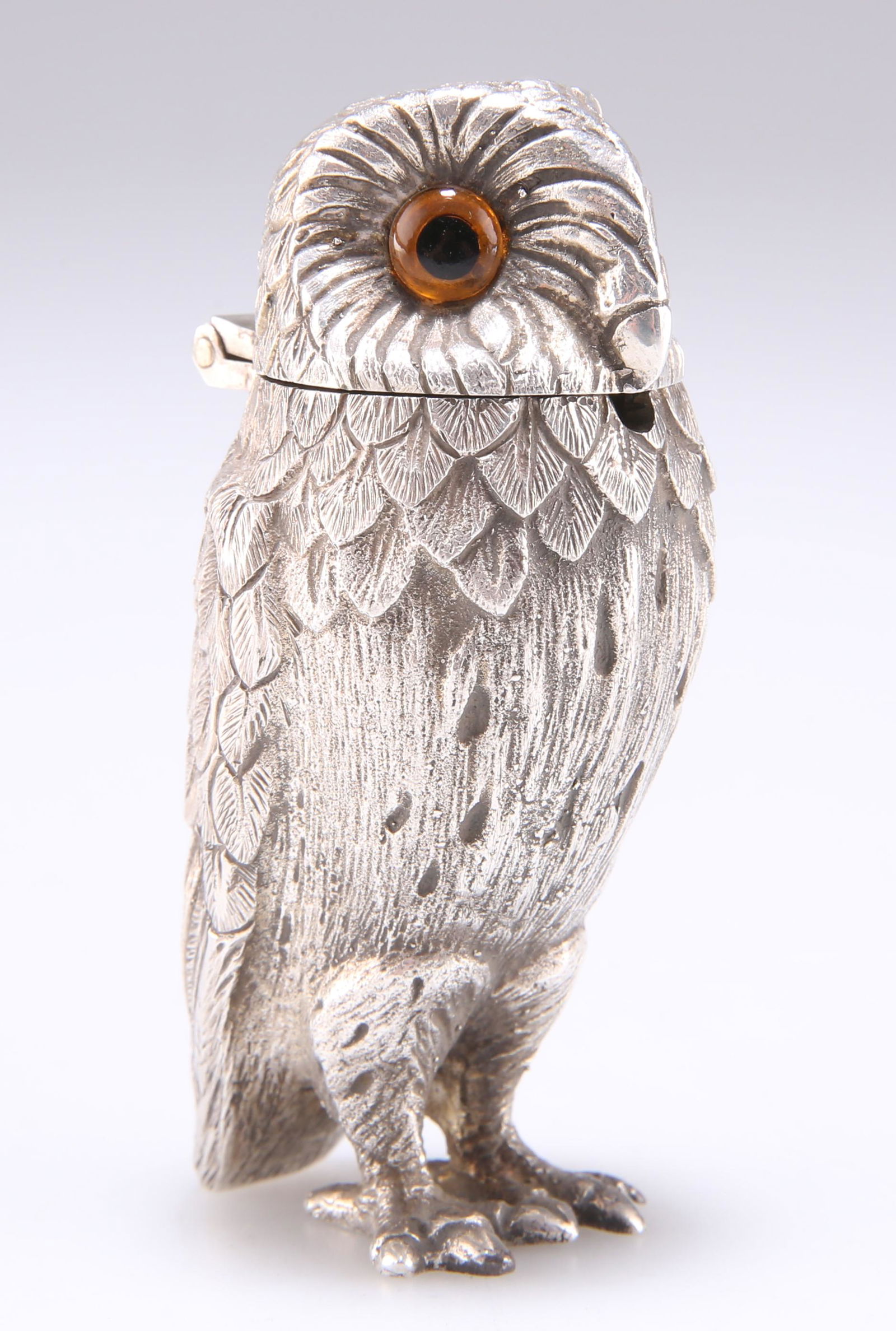 AN ELIZABETH II CAST SILVER NOVELTY MUSTARD POT, by: AN ELIZABETH II CAST SILVER NOVELTY MUSTARD POT, by Richard Comyns, London 1972, in the form of an owl. 7.2cm high, 3.4 troy ounces