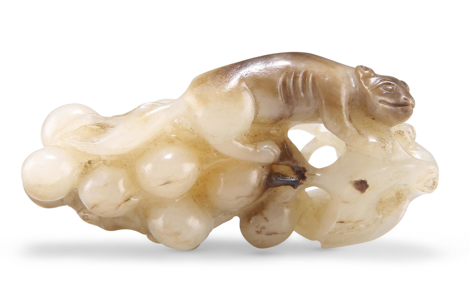 A CHINESE JADE CARVING OF A SQUIRREL AND GRAPES GROUP,: A CHINESE JADE CARVING OF A SQUIRREL AND GRAPES GROUP, depicting a squirrel climbing upon a bunch of grapes, a smaller squirrel to the underside. 3.5cm by 7.5cm