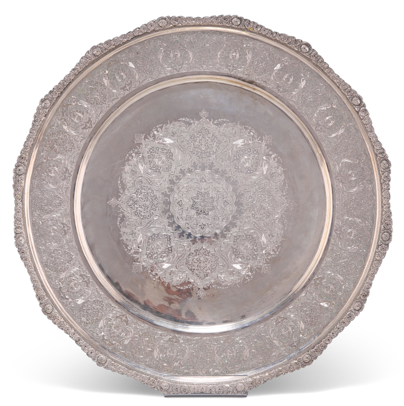 AN IRANIAN SILVER DISH, of large proportions, with (1 of 1)