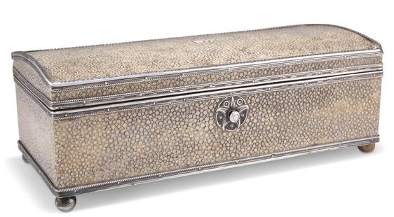 AN ARTS AND CRAFTS SILVER-MOUNTED SHAGREEN CIGARETTE BOX, C: AN ARTS AND CRAFTS SILVER-MOUNTED SHAGREEN CIGARETTE BOX, CIRCA 1920, by John Paul Cooper, with hinged slightly domed top, one ball foot replaced, struck JPC and with plaque to interior of lid. 22cm w