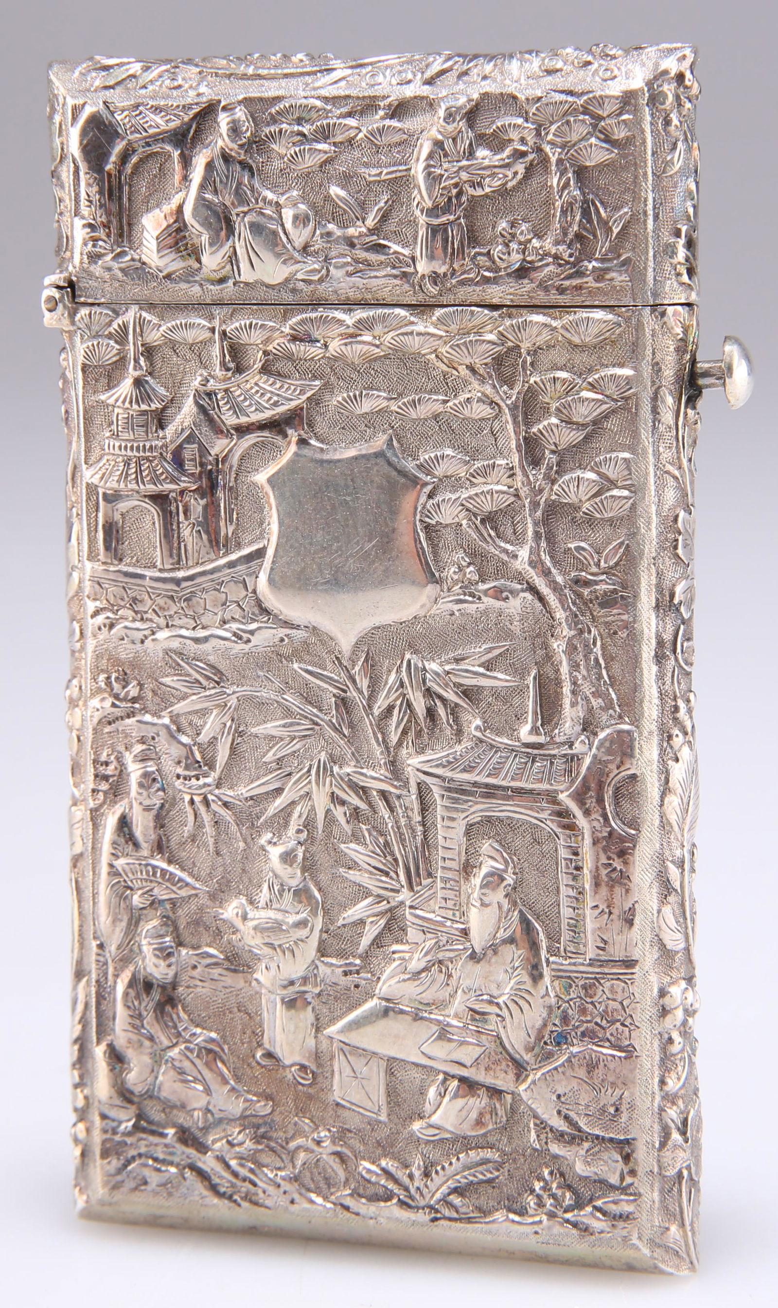 A CHINESE SILVER CARD CASE, by Cumshing, Canton, rectangular with hinged cover and push-button openi (1 of 2)