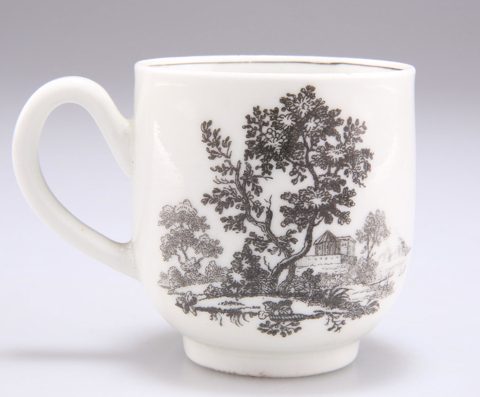 A MID TO LATE 18TH CENTURY WORCESTER PORCELAIN 'EUROPEAN RUINS' COFFEE CUP, with loop handle, black (1 of 2)
