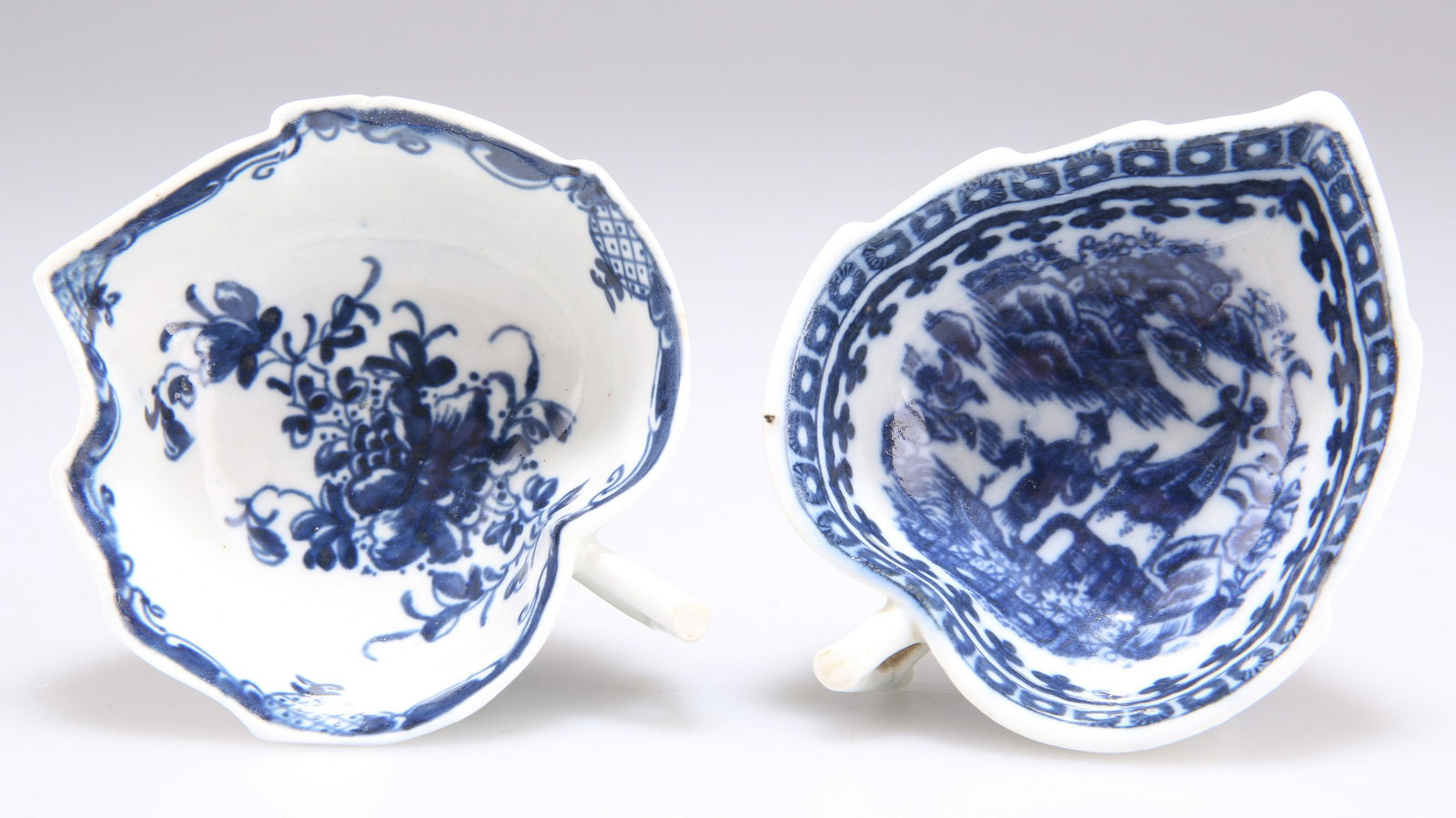 A CAUGHLEY PICKLE DISH, CIRCA 1780-90, of typical leaf-form, underglaze blue decorated with the 'Fis (1 of 2)