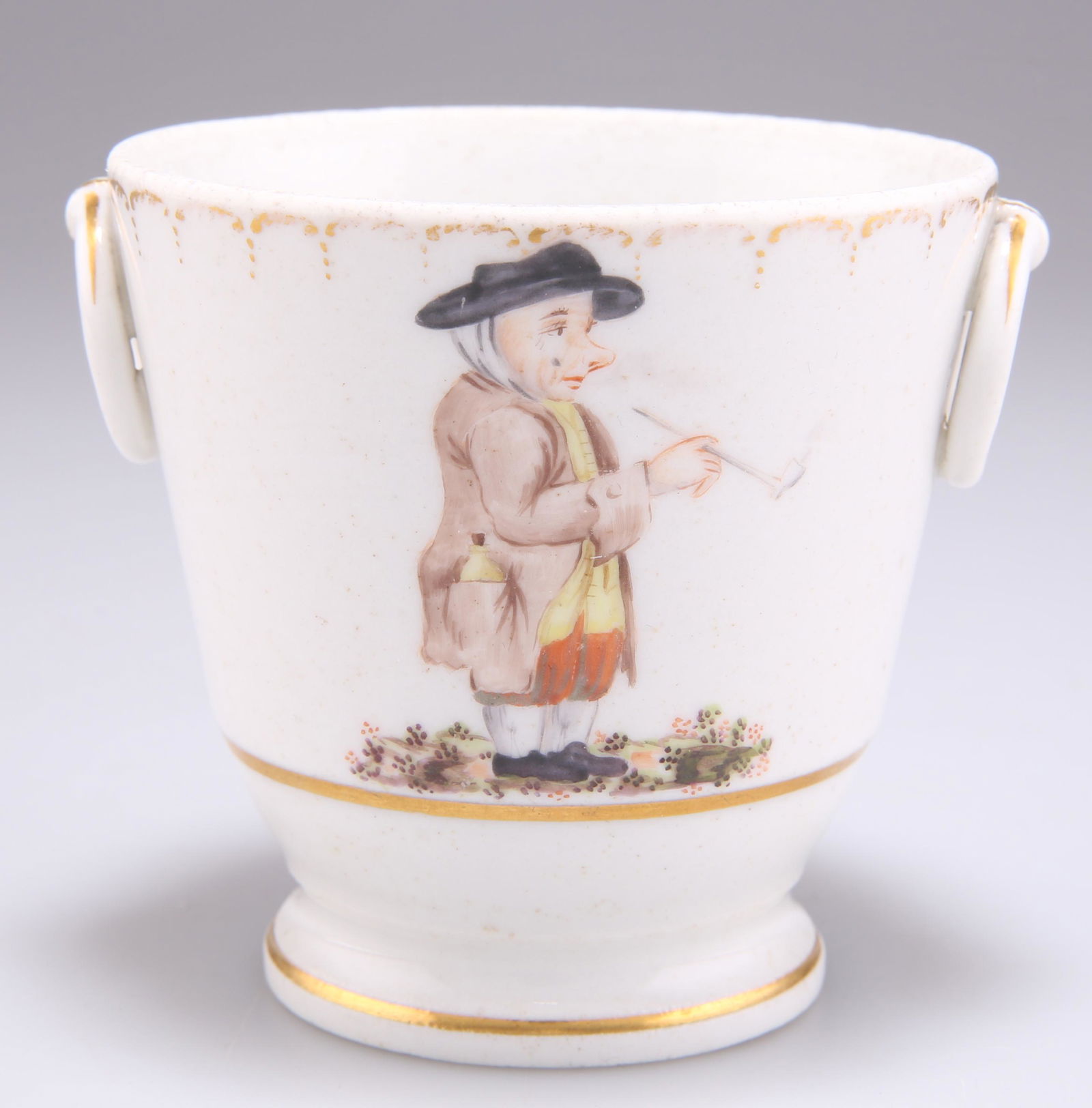 A 19TH CENTURY PORCELAIN SMALL CACHE-POT, with ring handles and raised on a circular foot, painted w (1 of 2)