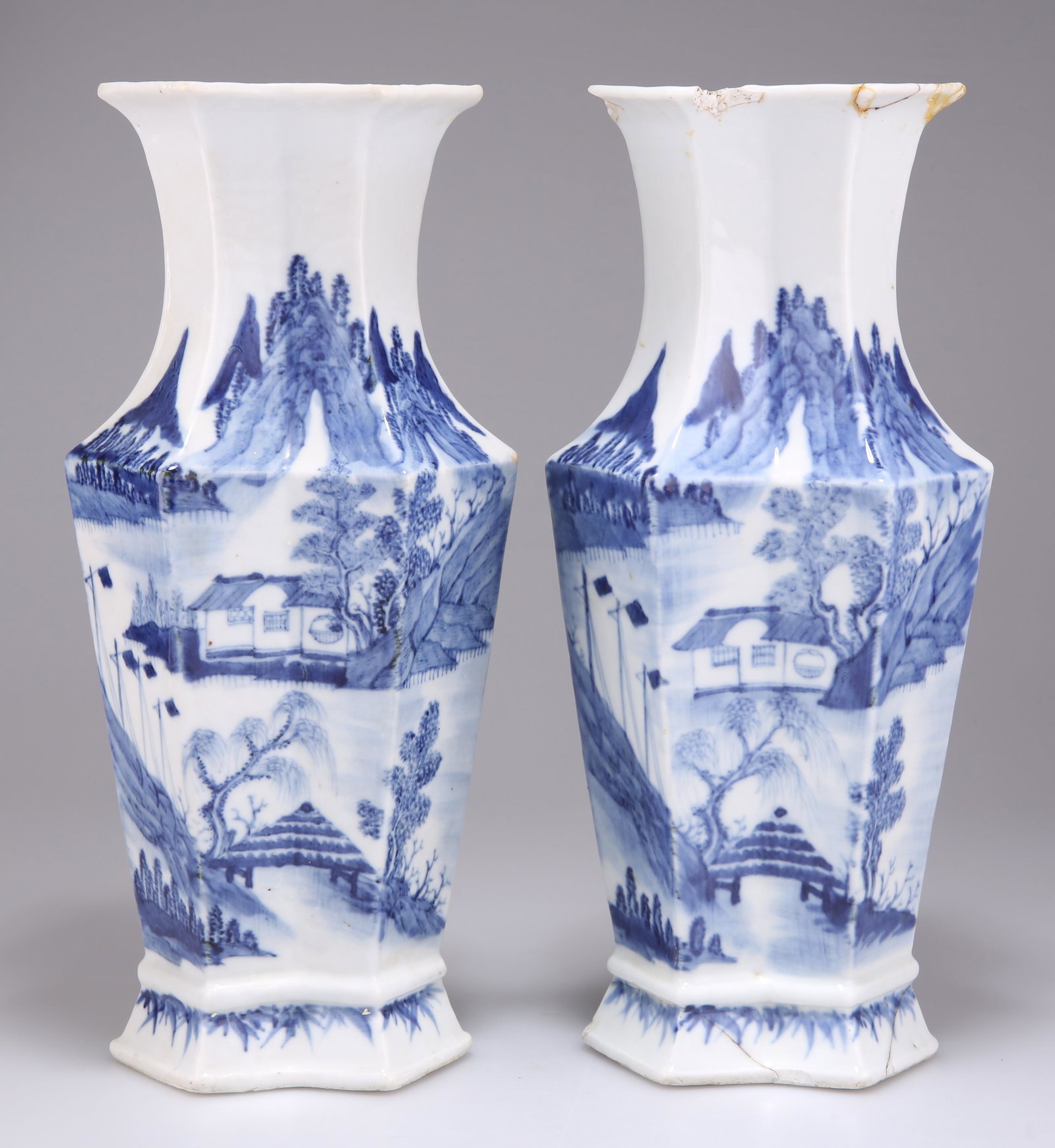A PAIR OF CHINESE BLUE AND WHITE VASES, QING DYNASTY, 18TH/19TH CENTURY, of conjoined rhombus form, (1 of 3)