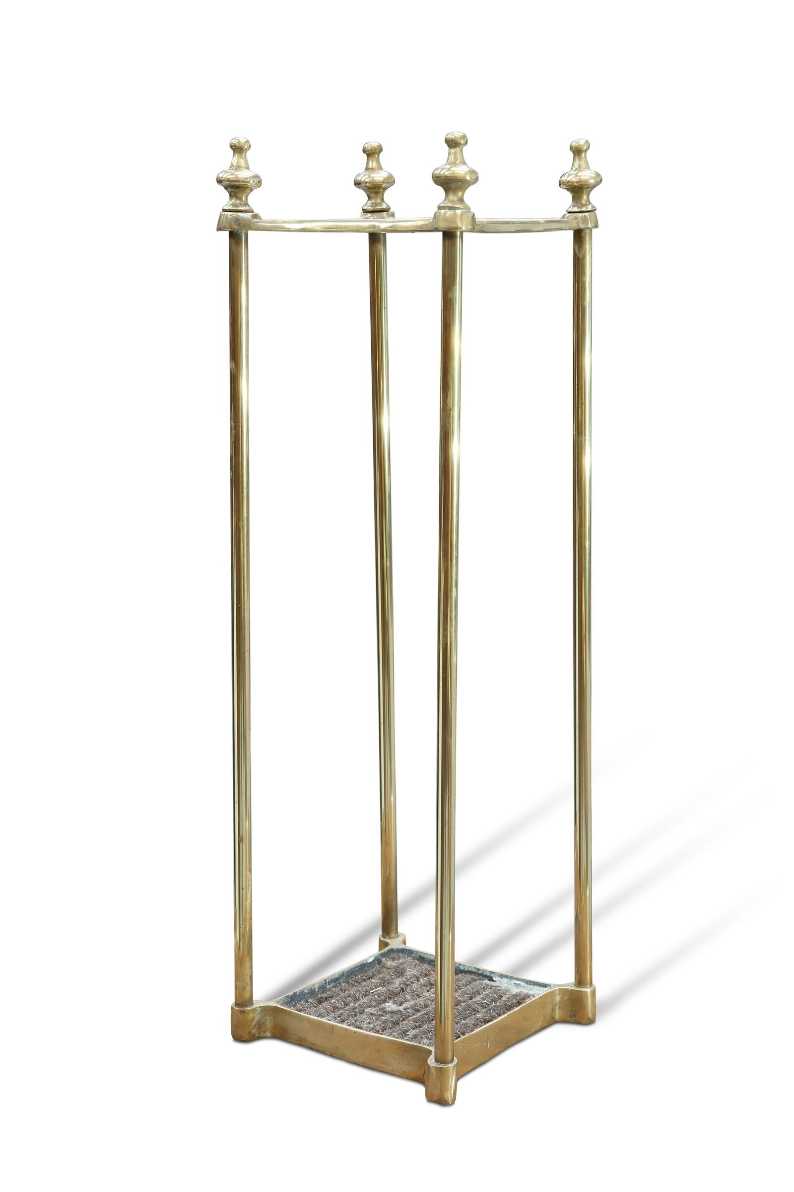 AN EARLY 20TH CENTURY BRASS STICK STAND, square, with four sections. 62cm high (1 of 1)