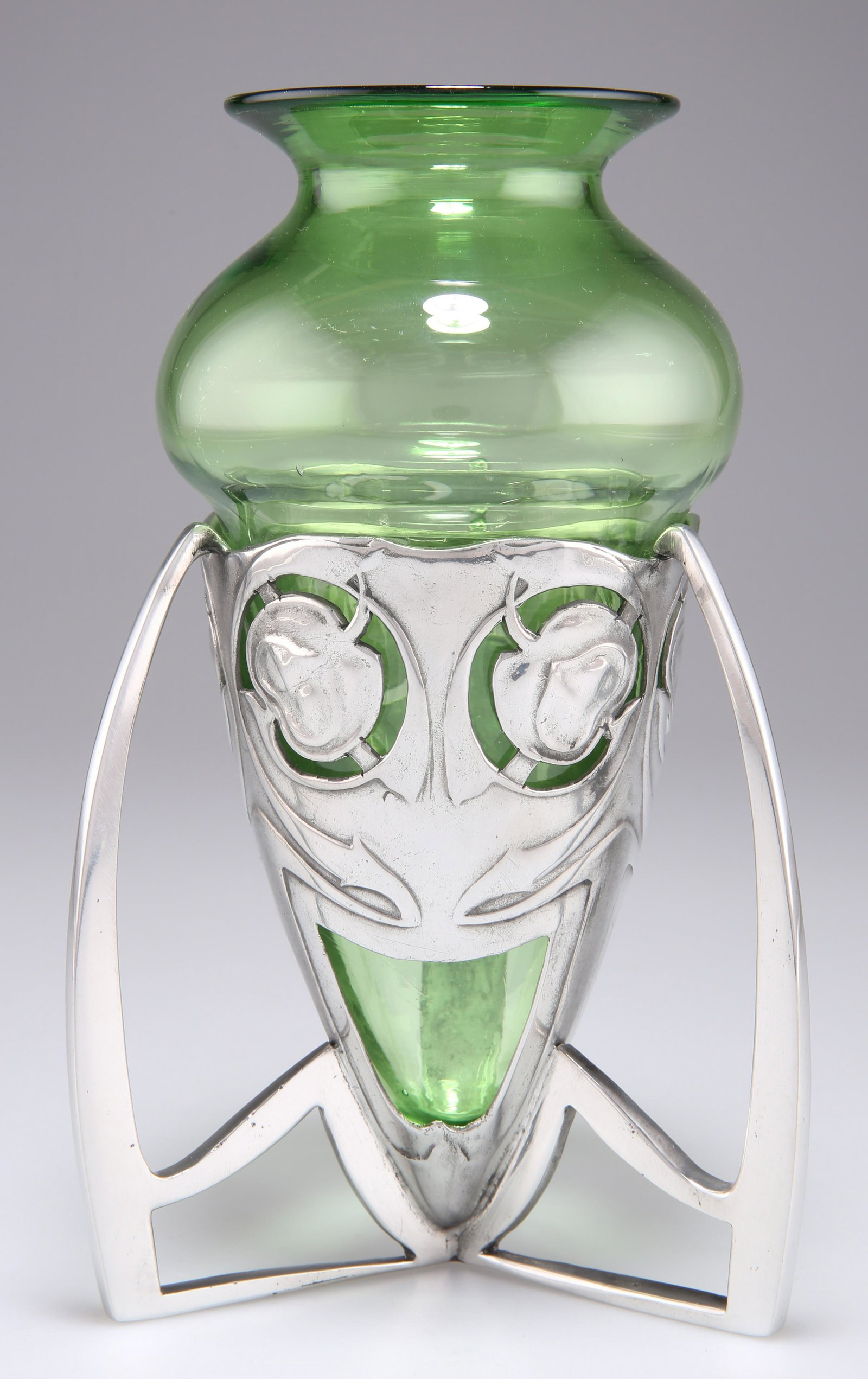ARCHIBALD KNOX (1864-1933) FOR LIBERTY & CO, A TUDRIC PEWTER BOMB VASE, of tapering form with three (1 of 2)