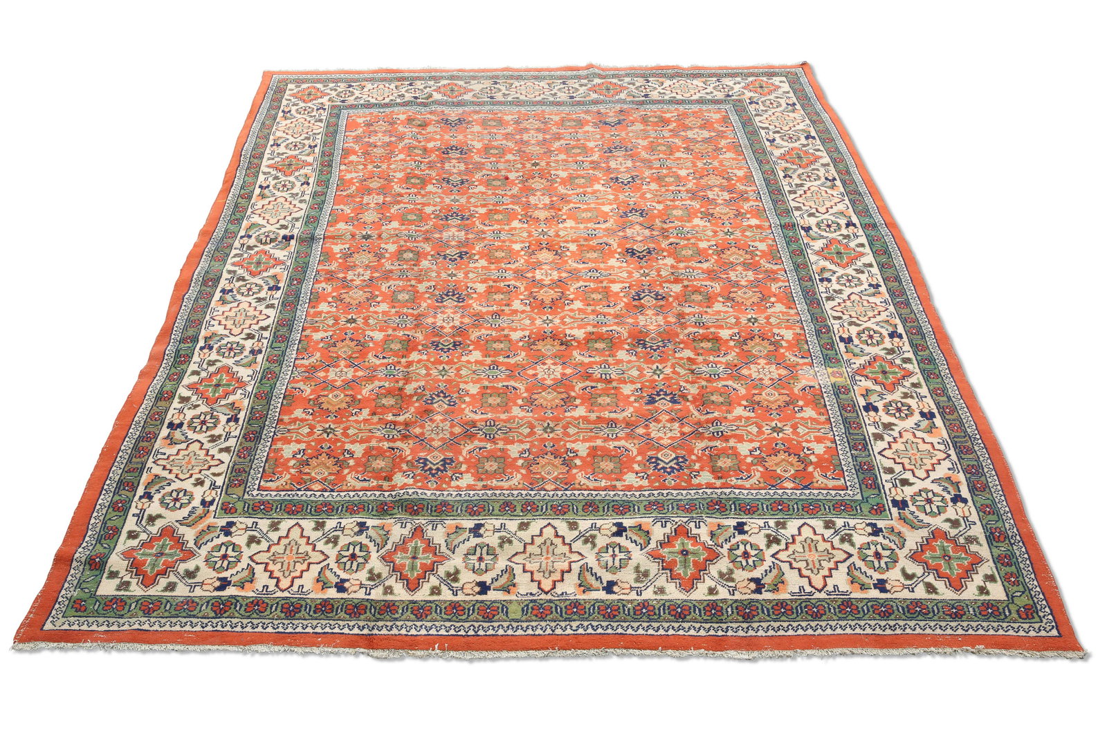 A TURKISH CARPET, CIRCA 1970, the orange field with all-over design of flowerheads and sprays, the b (1 of 1)