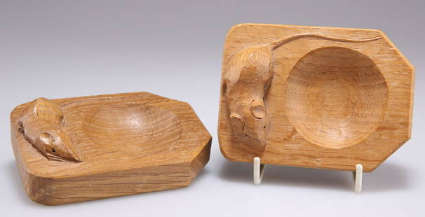 ROBERT THOMPSON OF KILBURN, TWO MOUSEMAN OAK PIN TRAYS, of characteristic form, with carved mouse si: ROBERT THOMPSON OF KILBURN, TWO MOUSEMAN OAK PIN TRAYS, of characteristic form, with carved mouse signatures. (2) 8cm by 10.5cm