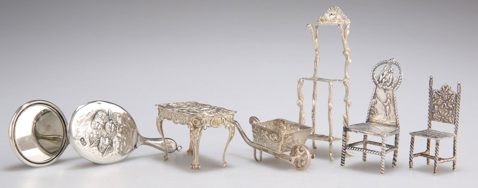 A GROUP OF SILVER MINIATURES (1 of 2)