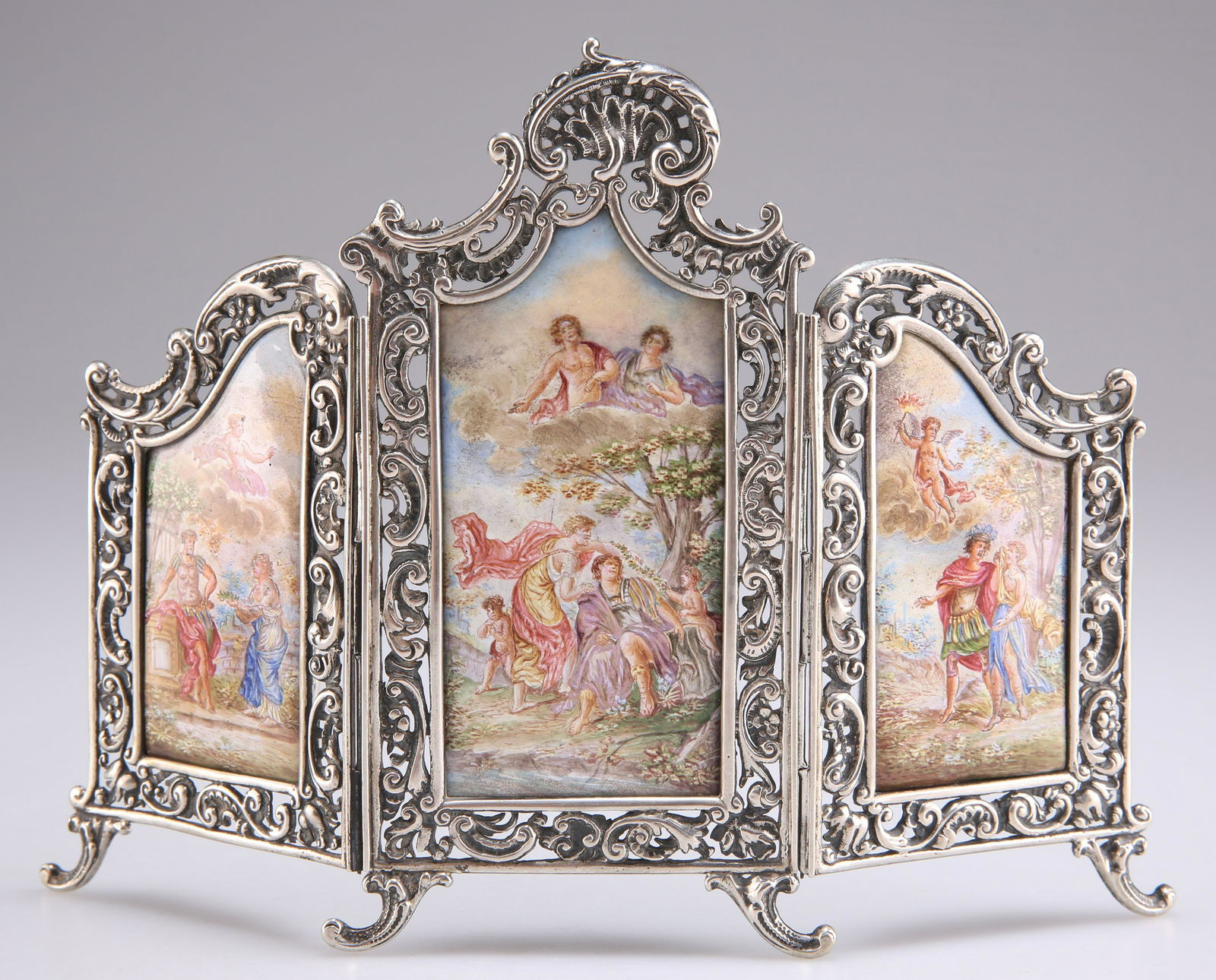 A VIENNESE SILVER AND ENAMEL SMALL TRIPTYCH TABLE-SCREEN (1 of 1)