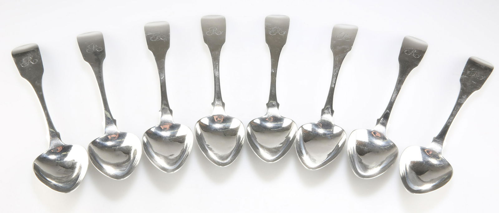 A SET OF EIGHT GEORGE III IRISH SILVER TABLESPOONS (1 of 2)