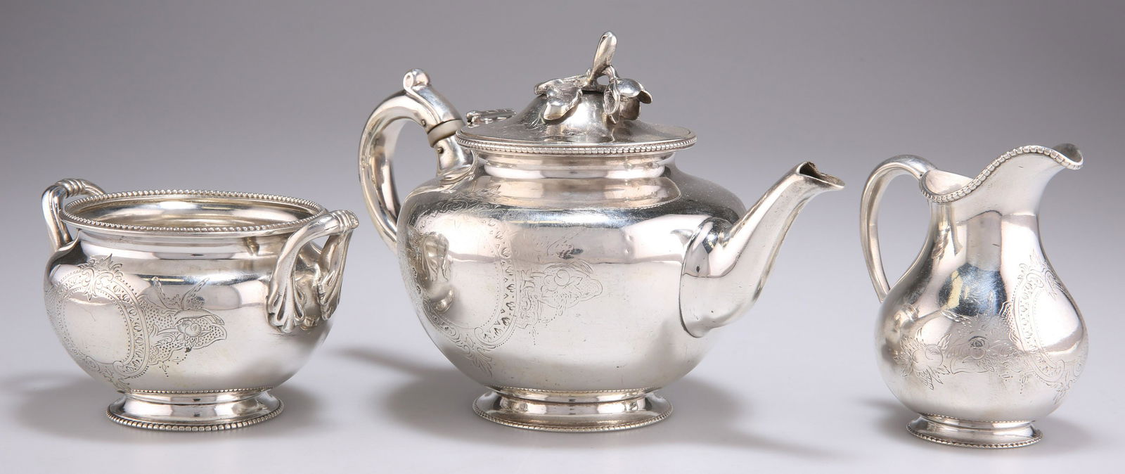 A VICTORIAN SCOTTISH SILVER THREE-PIECE TEA SERVICE (1 of 2)