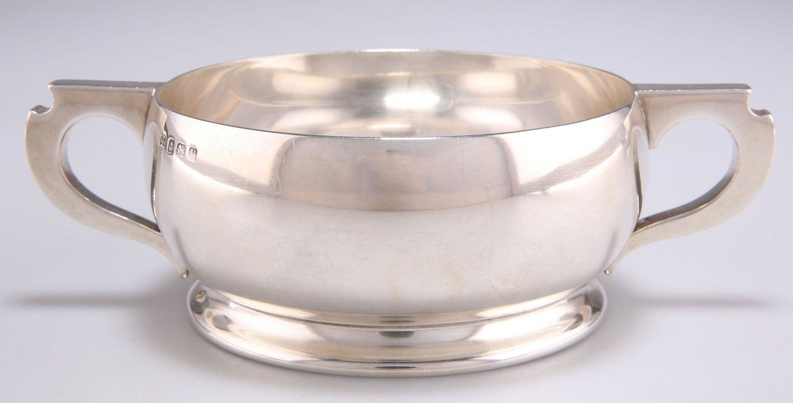 A GEORGE V SILVER TWO-HANDLED BOWL (1 of 1)
