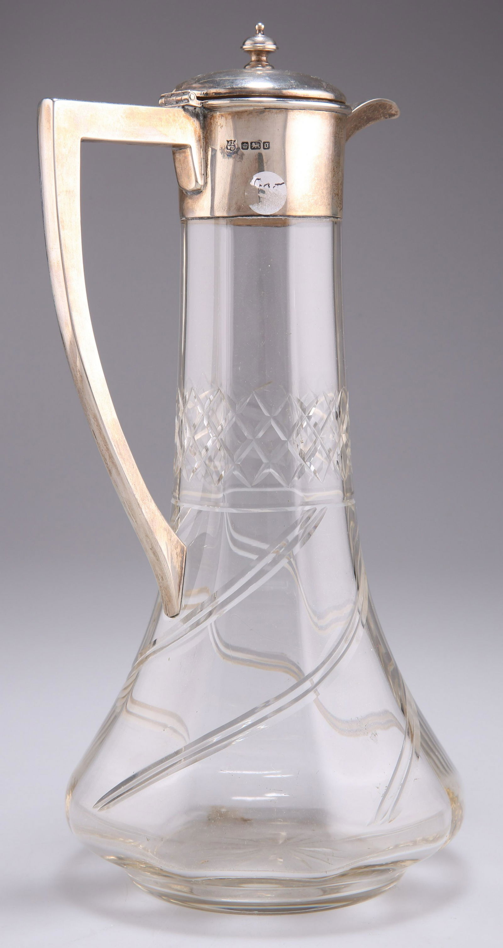 AN EDWARDIAN SILVER-MOUNTED CLARET JUG (1 of 2)
