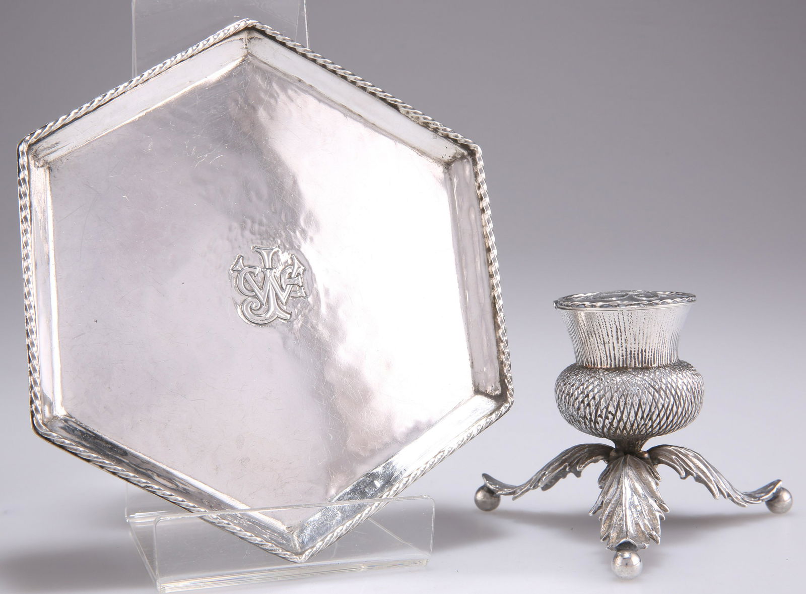 AN ARTS AND CRAFTS SILVER INKWELL AND A STAND (1 of 2)