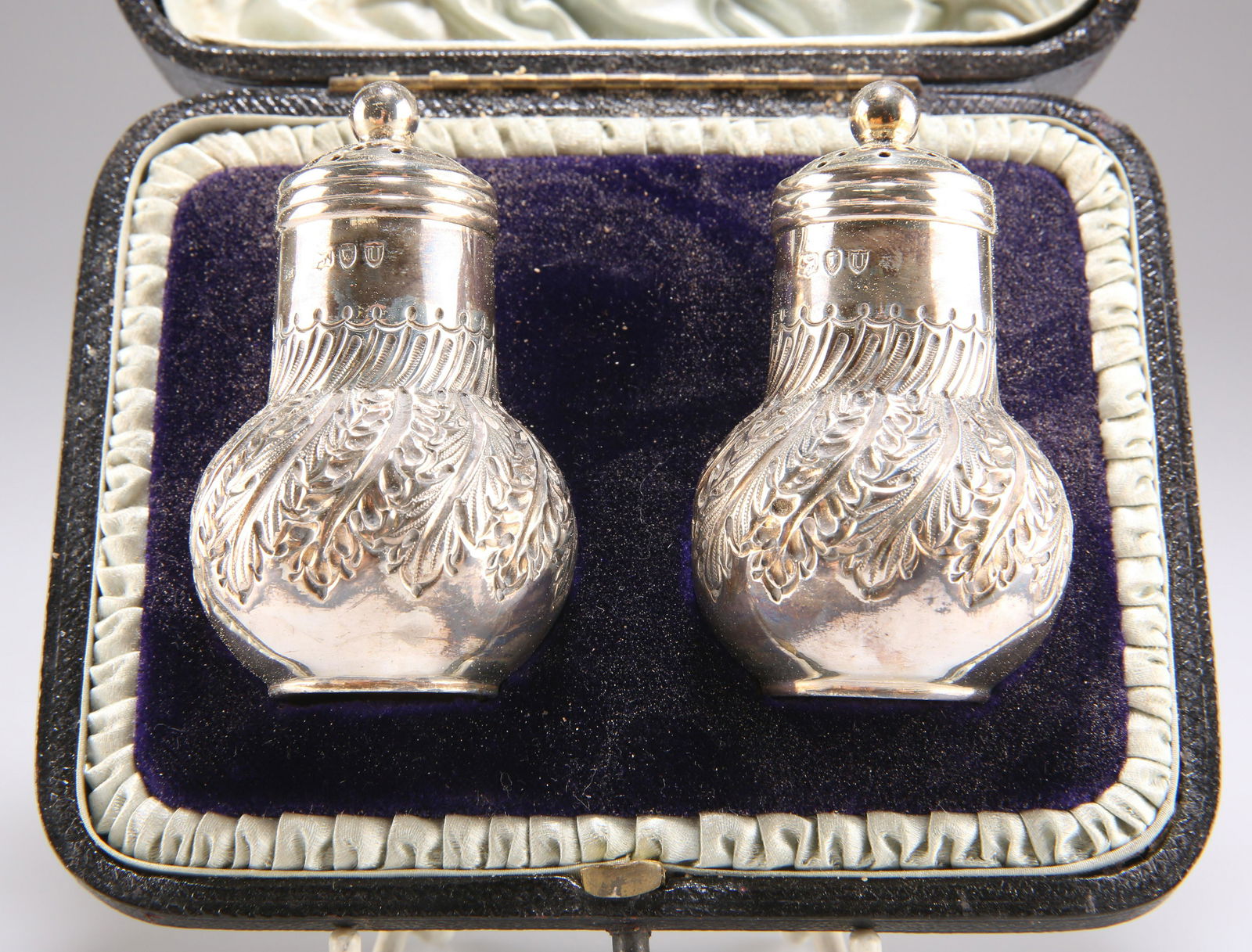 A PAIR OF VICTORIAN SILVER PEPPER POTS (1 of 1)