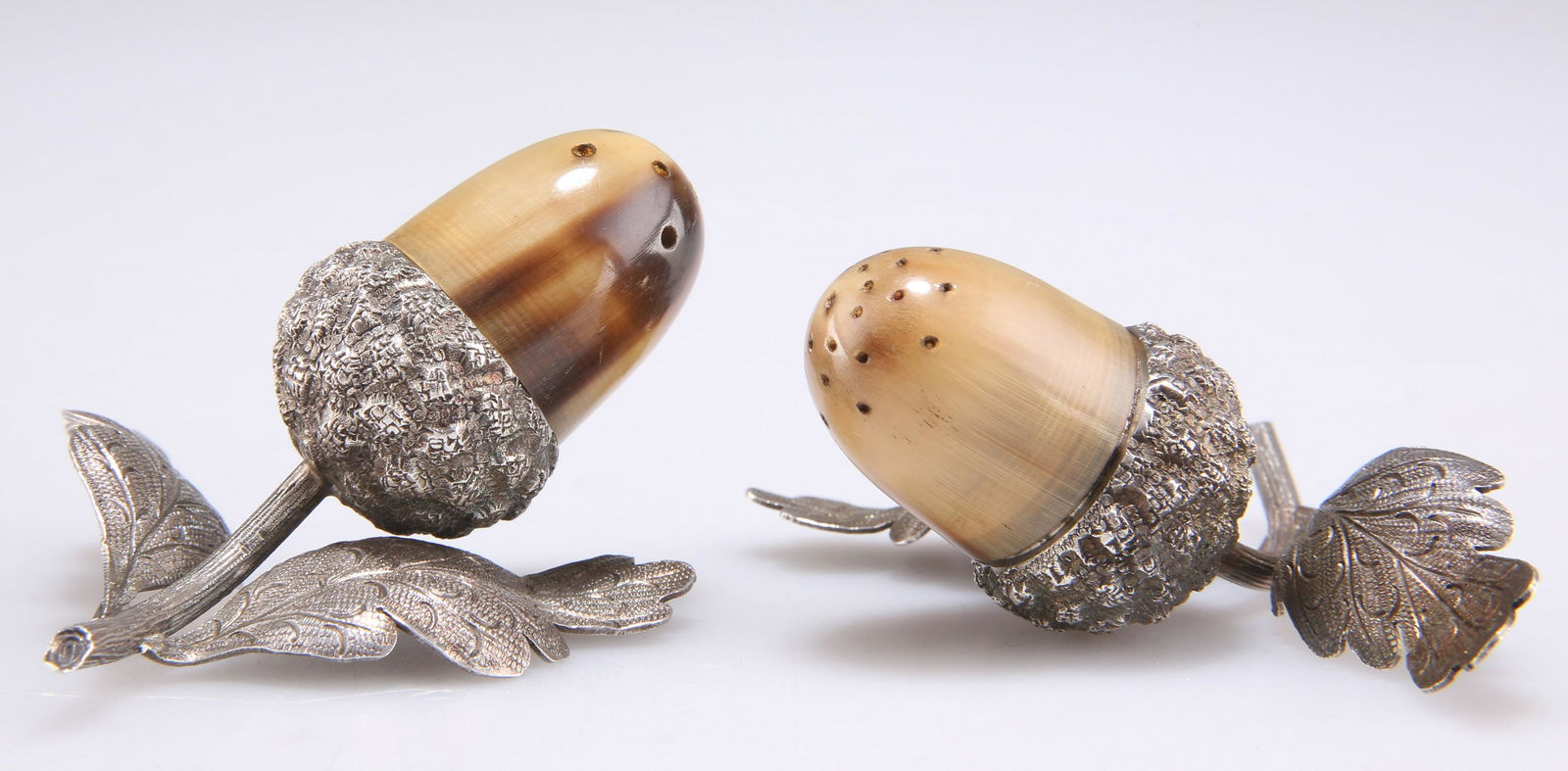 A PAIR OF VICTORIAN SILVER NOVELTY PEPPERS (1 of 1)