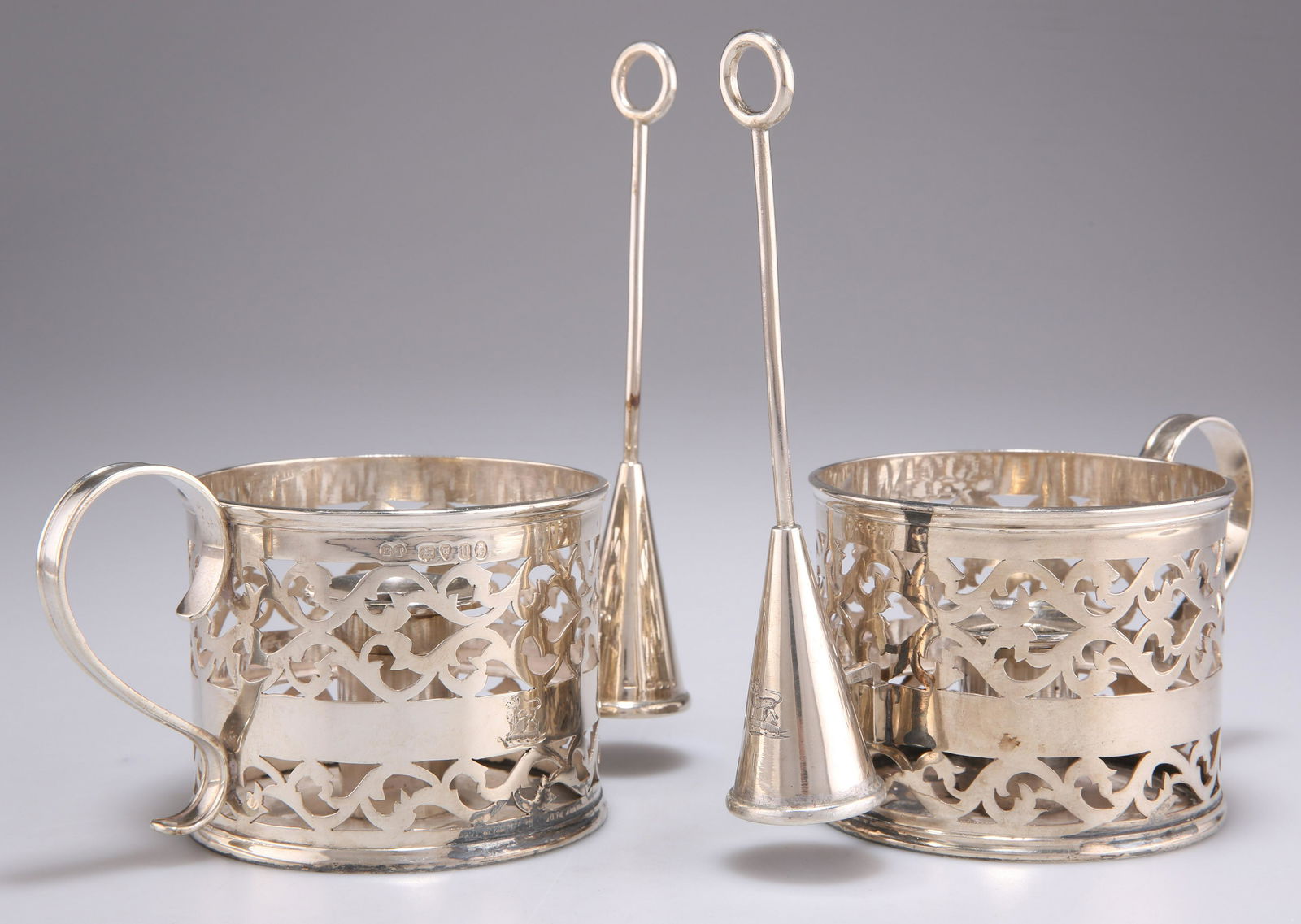 A PAIR OF VICTORIAN SILVER HURRICANE CHAMBERSTICKS (1 of 2)