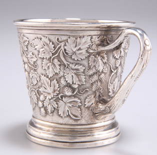 A VICTORIAN SILVER MUG: A VICTORIAN SILVER MUG, by John Hunt & Robert Roskell, London 1873, tapering cylindrical form, chased with fruiting vine and engraved with a monogram, signed 'HUNT & ROSKELL' and numbered 6548 to base