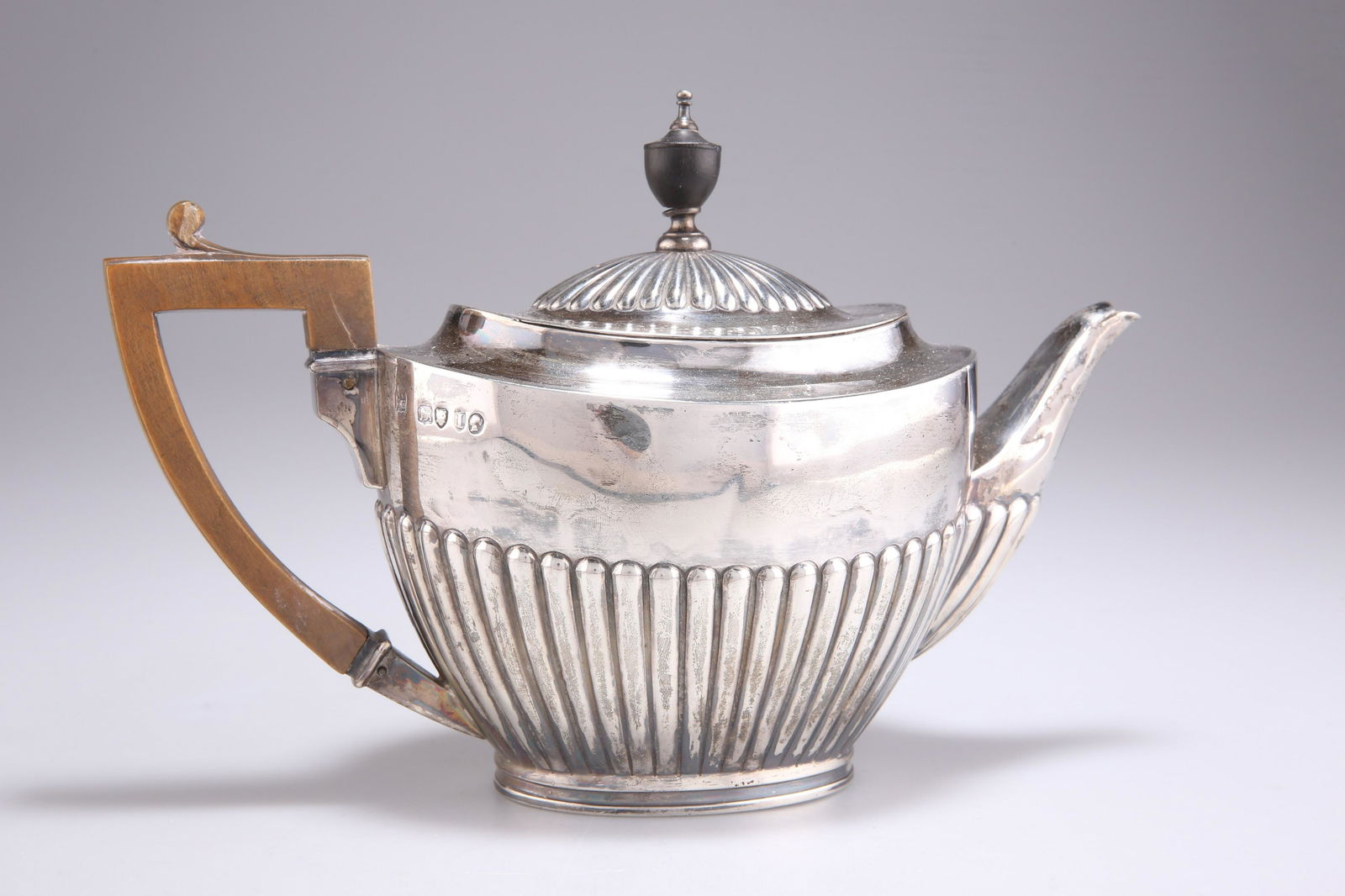 A VICTORIAN SILVER TEAPOT (1 of 2)