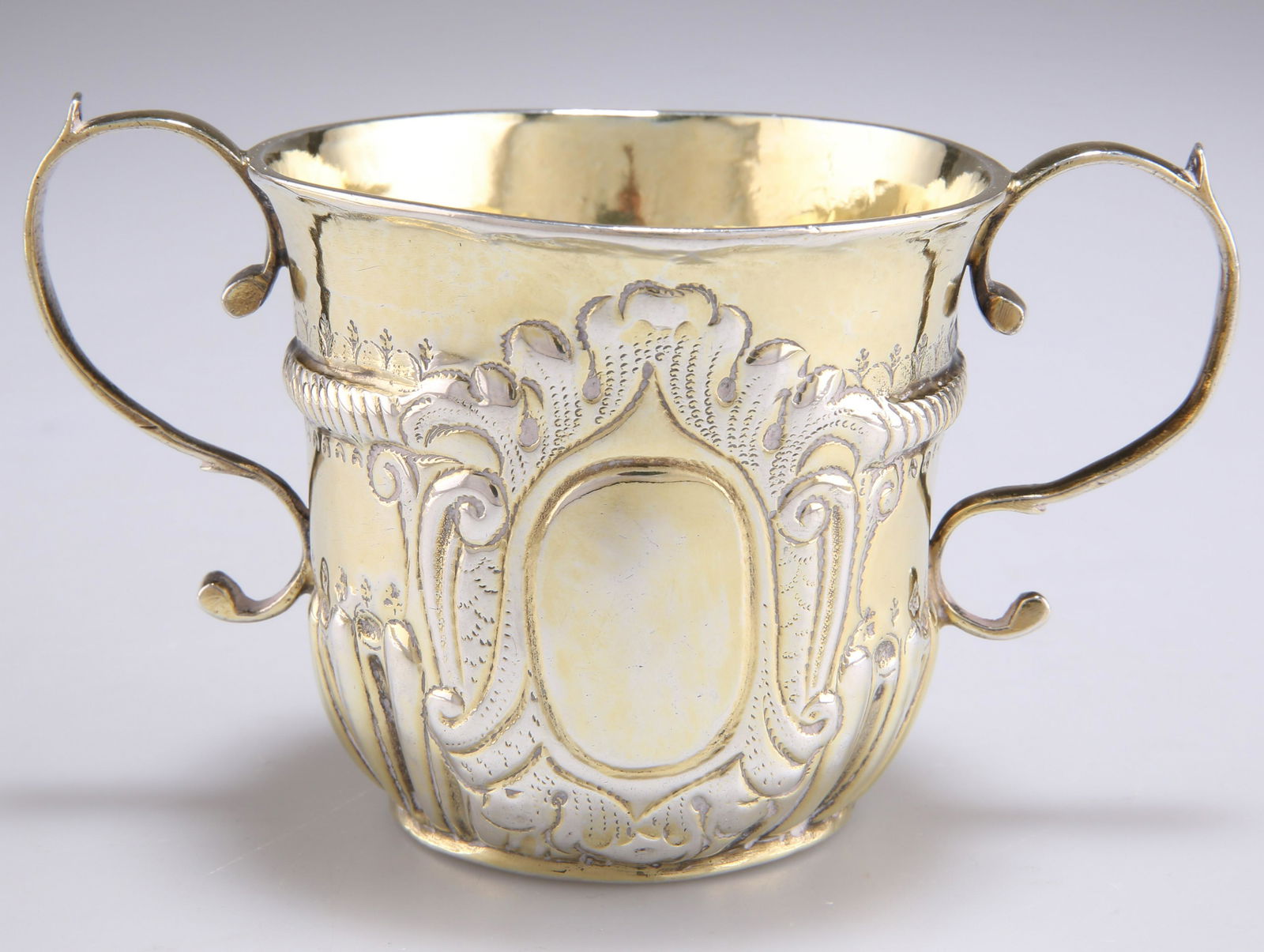 A GEORGE I SILVER-GILT PORRINGER (1 of 2)