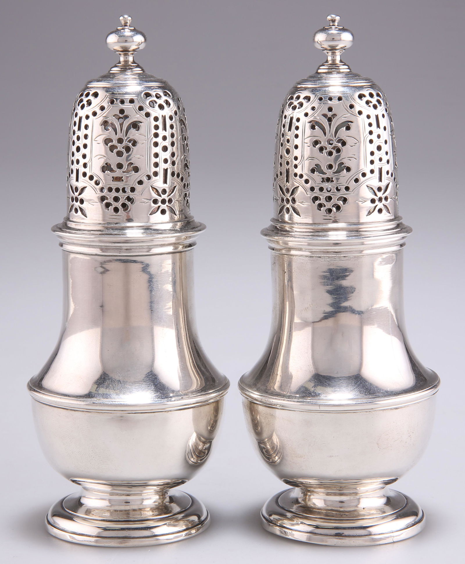 A PAIR OF GEORGE II SILVER CASTERS (1 of 1)