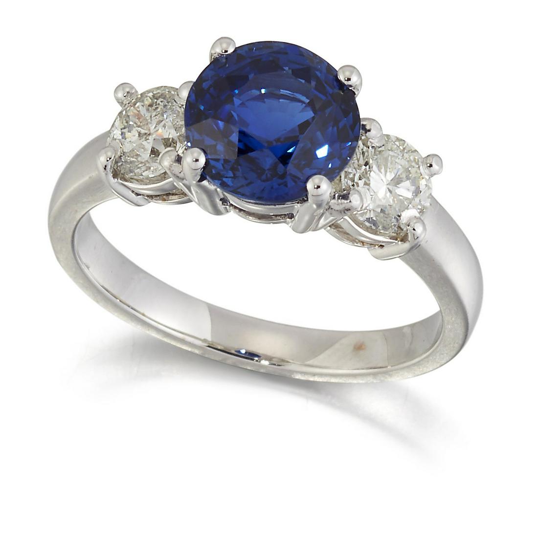 A SAPPHIRE AND DIAMOND THREE STONE RING (1 of 1)